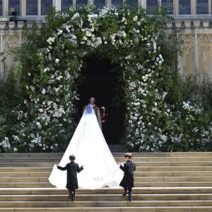 Meghan Markle and her bridal party arrive for the the wedding ceremony. | Ben Birchhall/pool photo via AP