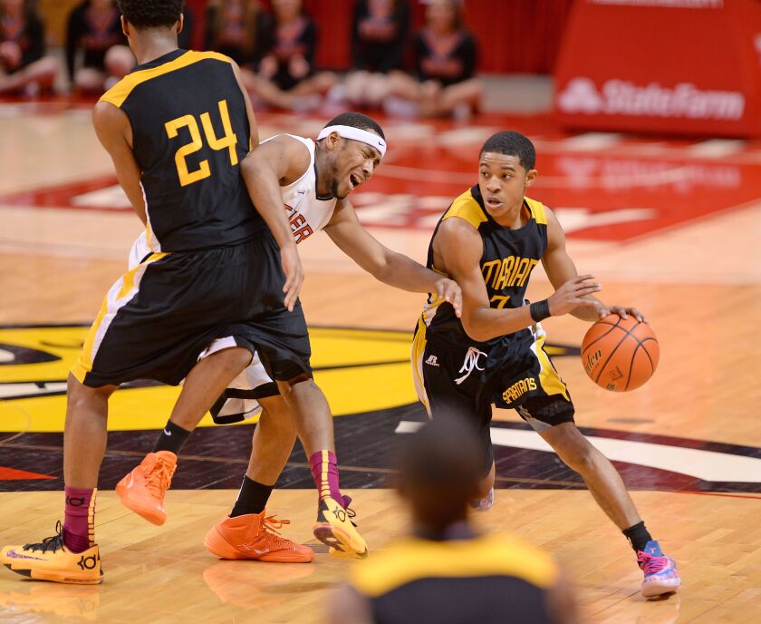 Marian Catholic’s Tyler Ulis during the class 4A supersectional against Edwardsville.