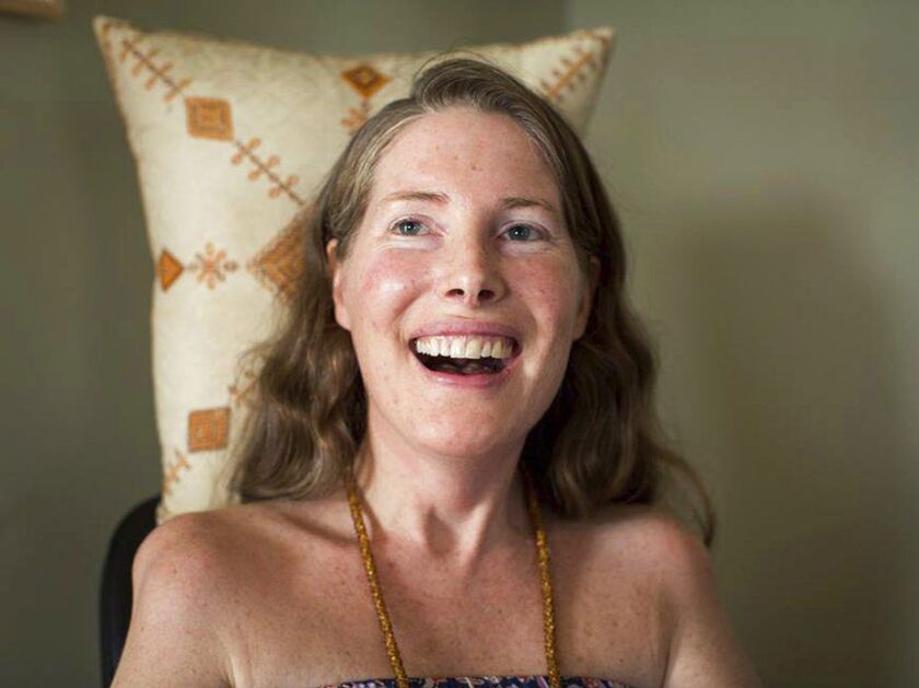 Betsy Davis smiles during her “Right To Die Party” in Ojai, Calif. Davis threw herself the party as she became one of the first to use a California law to take her own life in 2016. Advocates say the terminally ill may die tougher deaths after a judge on