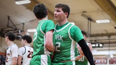York’s Jackson Rennick (52) chest bumps Joseph Lubbe (25) during the game against Libertyville.