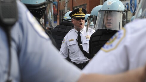 Police Supt. Garry McCarthy directs officers to control a crowd at Michigan Avenue and Cermak Road in 2012 during the NATO summit.