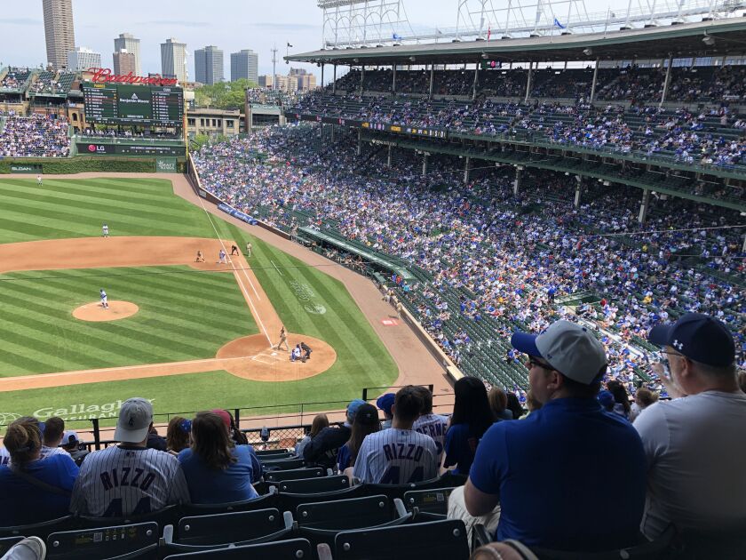 Even at a social-distanced half capacity, Wrigley Field looked well-populated Wednesday. A Bud Light is $10.