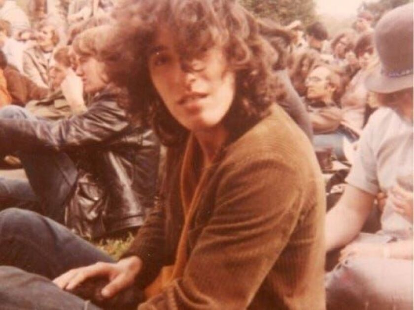 Bruce Springsteen in the crowd at Monmouth College in New Jersey, watching another band perform in 1969 before his band, “Child,” took the stage.
