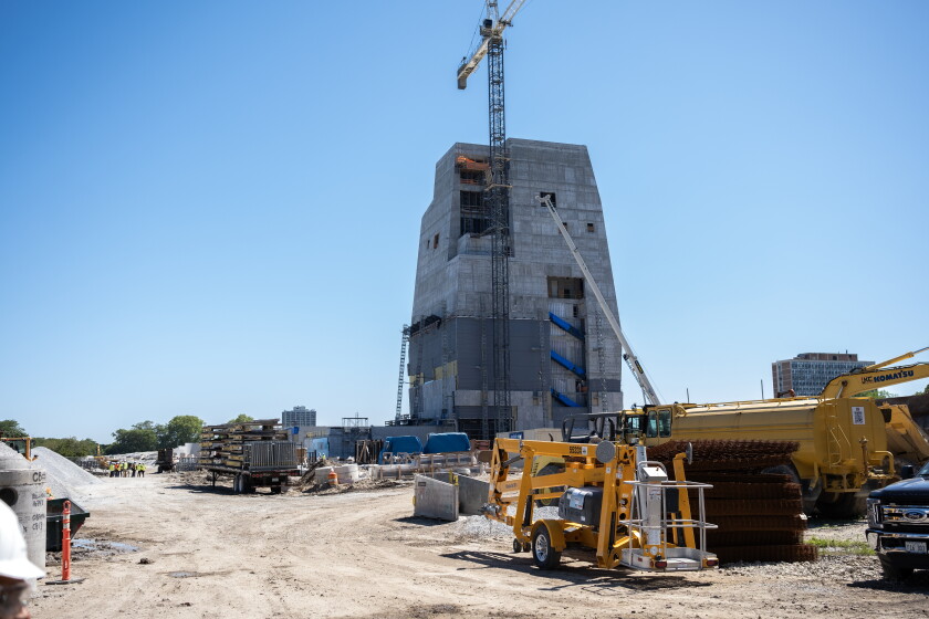 President Building Project Barack Obama visits presidential center site as tower reaches full ...