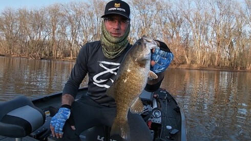 Bob Johnson with a smallmouth bass from the Kankakee River. Provided photo