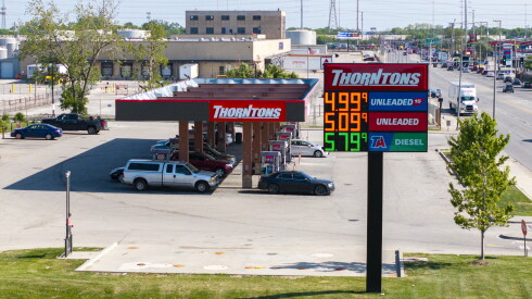 Cars are parked at the pump at a Thorntons gas station in Cicero, where diesel is priced at $5.79 a gallon.