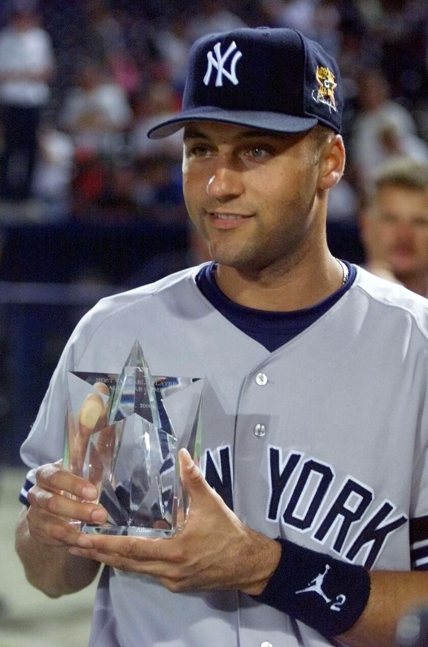 Derek Jeter of the New York Yankees holds the MVP