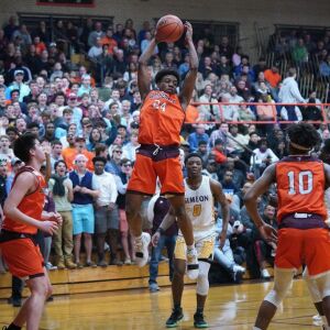 Brother Rice’s Marquise Kennedy (24) hauls in a rebound against Simeon, Friday 03-01-19. Worsom Robinson/For Sun-Times