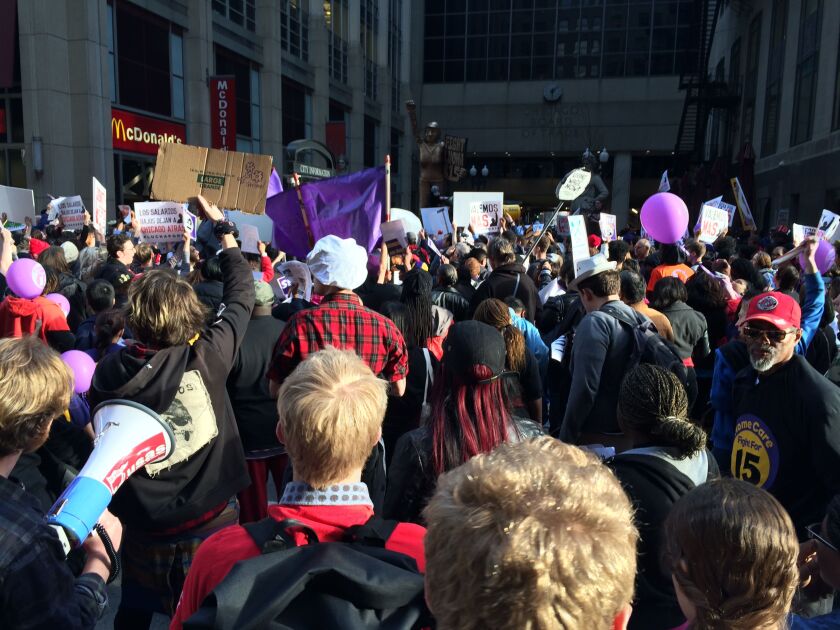 Outside a downtown McDonald’s restaurant at 111 W. Jackson on Wednesday evening, protesters chant: “McDonalds can you hear us?” and “We believe that we will win.” | John O’Neill/Sun-Times