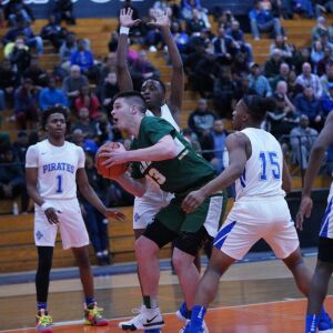 Lane’s Vuk Djuric (33) powers his way for two points against Proviso East, Wednesday 02-27-19. Worsom Robinson/For Sun-Times