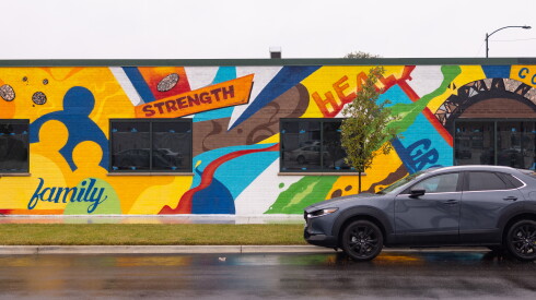 A mural by artists Joe "Cujo" Nelson and JoVonna Jackson is at 235 E. 103rd St. in Englewood.