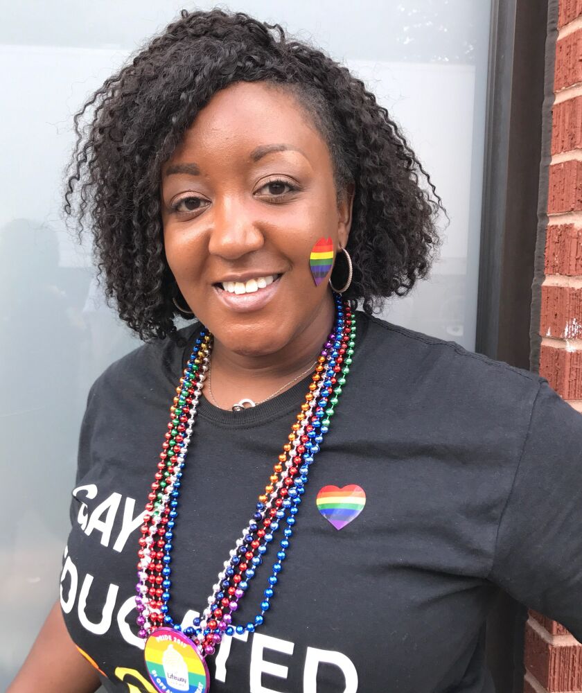 Adrienne Little came from Merrillville, Indiana, with her fiancee to celebrate the Pride Parade. | Jacob Wittich/Sun-Times