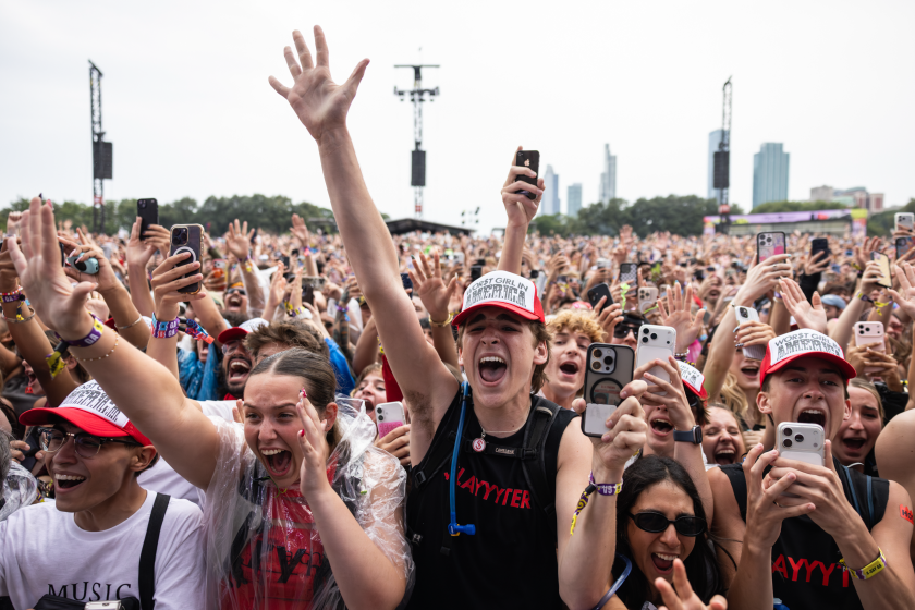 Fans dance and cheer as Slayyyter performs on the Bud Light stage on Day 2 of Lollapalooza in Grant Park, Friday, July 31, 2026.