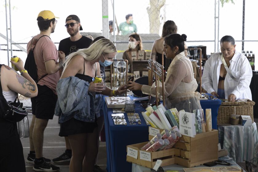 Festival goers shop at a fair on Day 1 of the Pitchfork Music Festival in Union Park.