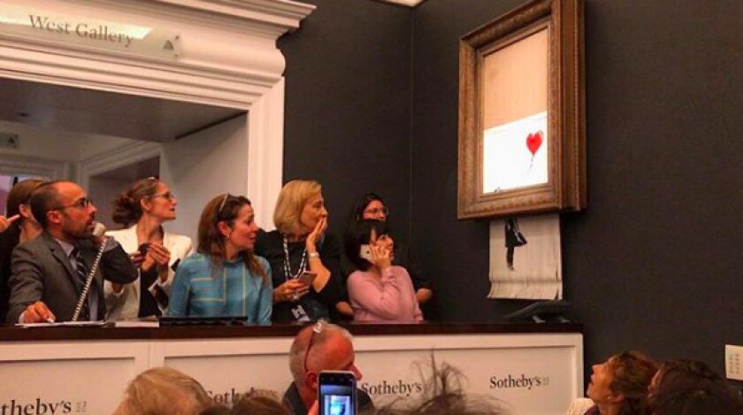 A Banksy artwork self-destructed moments after being sold at auction for 1.04 million pounds ($1.4 million), in a prank orchestrated by the elusive street artist. | Banksy Instagram via AP