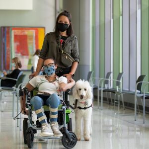 Mikaylah MacDonald, 15, and her mom pose for a photo after MacDonald received a COVID-19 vaccine at the Rush University Medical Center in the Illinois Medical District, Thursday morning, May 13, 2021. Kids as young as 12 became eligible for the COVID-19 vaccine Thursday. | Pat Nabong/Sun-Times