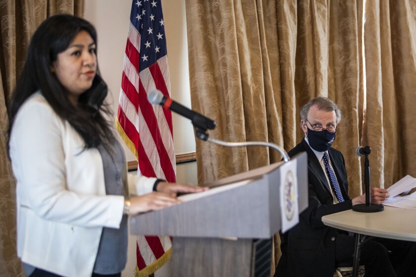 Illinois’ former Speaker of the House Mike Madigan listens as Angelica Guerrero-Cuellar speaks during a committee hearing Sunday on the Southwest Side to decide who will take over as state representative in the 22nd House District seat, a position held by Madigan since 1971.