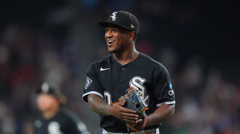 The White Sox' Luisangel Acuña smiles after pitching in the eighth inning against the Texas Rangers on Tuesday.