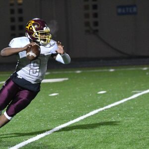 Solorio’s Tyrell Williams (9) looks for a receiver. Worsom Robinson/For the Sun-Times.