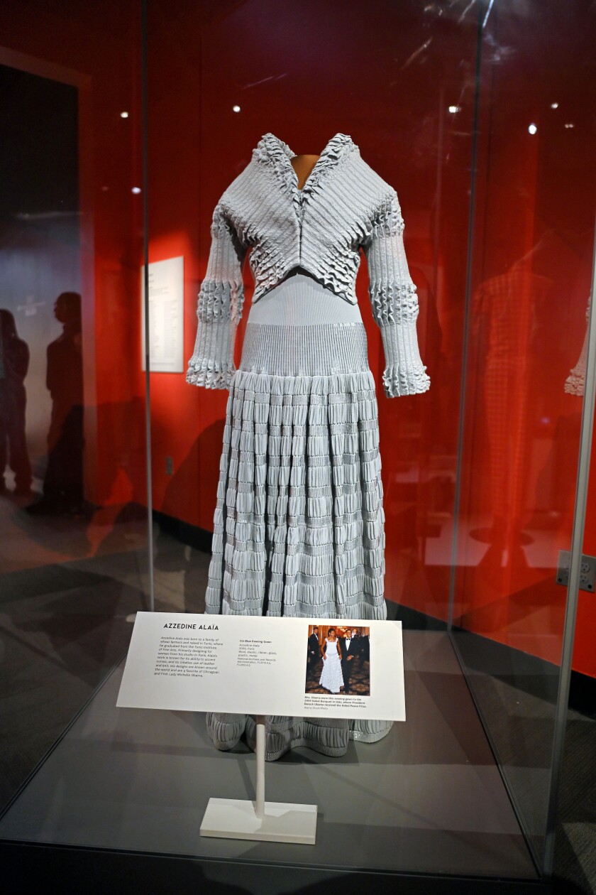 "Ice Blue Evening Gown," a designer's piece from Azzedine Alaia that Michelle Obama wore to the 2009 Nobel Banquet in Oslo, where former President Barack Obama received the Nobel Peace Prize. This dress is a part of the "Africa Fashion," a new exhibition exploring the global impact of African fashion, at the Field Museum in Chicago, Feb. 26, 2025.