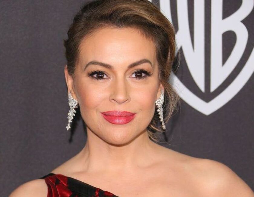 Alyssa Milano arrives for the Warner Bros. and In Style 20th annual post Golden Globes party at the Oasis Courtyard of the Beverly Hilton hotel in Beverly Hills on January 6, 2019. | JEAN-BAPTISTE LACROIX/AFP/Getty Images