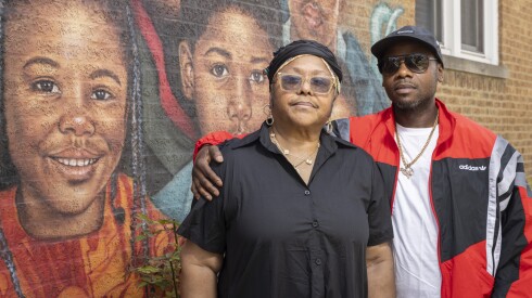 Faybe Norman and Denardo Buford pose for a photo in front of a mural dedicated to Denardo’s son, Denardo Buford Jr.