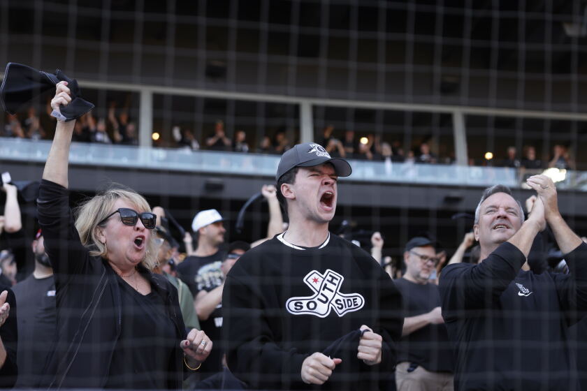 Chicago White Sox fans cheer Wednesday during the team's game against the Cleveland Guardians at Rate Field.