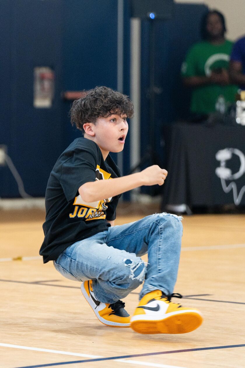 Nolan Bowers performs in a dance battle on Saturday at the during the This Is Life Youth Talent Showcase in Englewood.