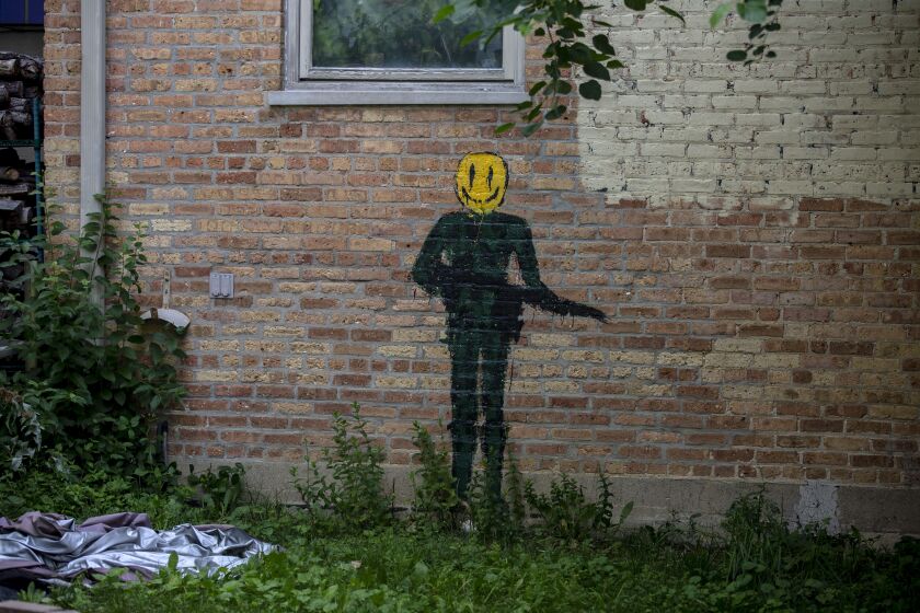 A mural on the back of the house where Robert E. Crimo III's mother lives in Highland Park.