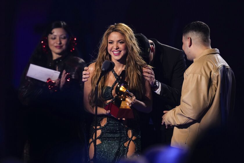 Shakira, from left, Bizarrap, and Kevyn Mauricio Cruz accept the award for song of the year for “Shakira: Bzrp Music Sessions, Vol. 53” during the 24th annual Latin Grammy Awards in Seville, Spain, Thursday.