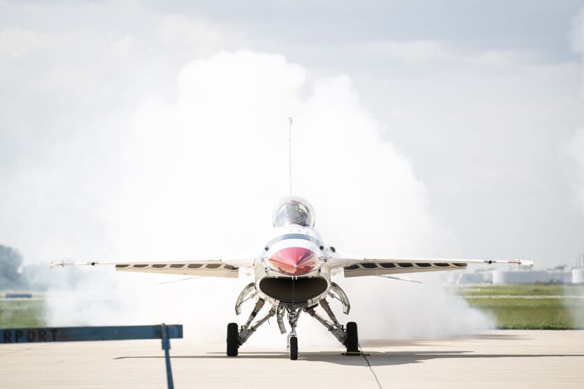 Exhaust comes out of the back of a Thunderbird aircraft after landing Thursday at the Gary/Chicago International Airport in Gary as pilots prepare for the weekend’s 2023 Chicago Air and Water Show.