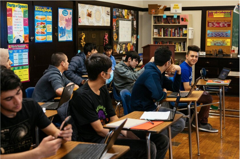 Omar (far right) during a class at Sullivan High School in Rogers Park.