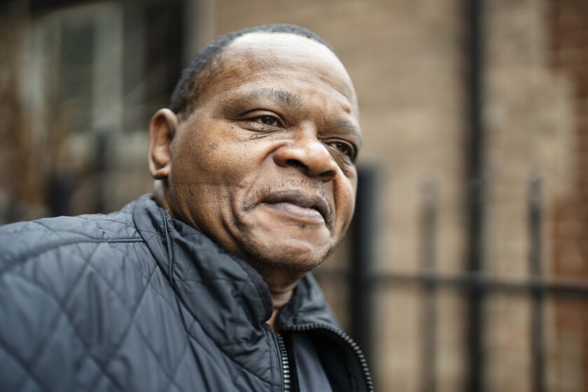 A close-up portrait photo of Nazareth Wilson outside his home in Grand Crossing.
