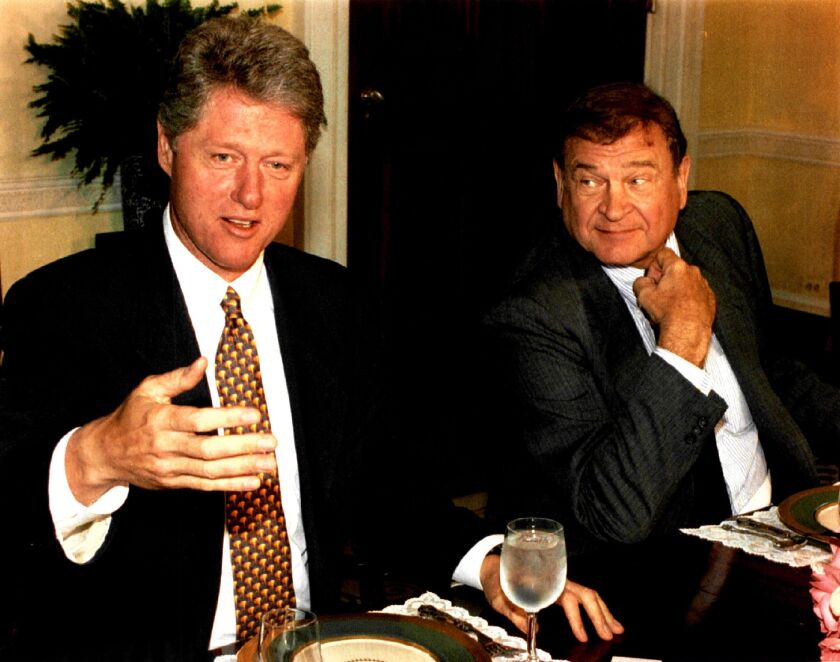 President Bill Clinton and U.S. Rep. Dan Rostenkowski share lunch in 1993. File Photo.