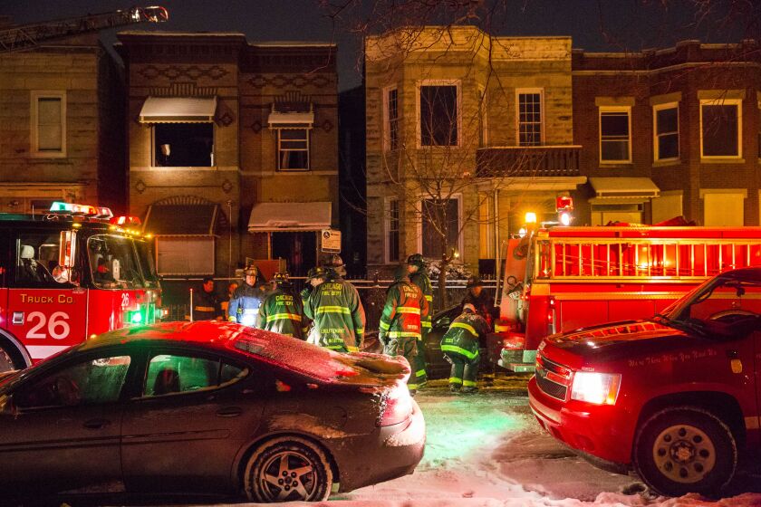 A man and a woman, both 90 years old, died in a fire Tuesday morning in the West Garfield Park neighborhood, authorities said. | Tyler LaRiviere/Sun-Times