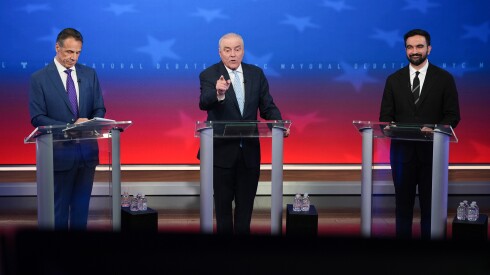 Republican candidate Curtis Sliwa, center, speaks during a mayoral debate with independent candidate former New York Gov. Andrew Cuomo, left, and Democratic candidate Zohran Mamdani, Thursday, Oct. 16, 2025, in New York.