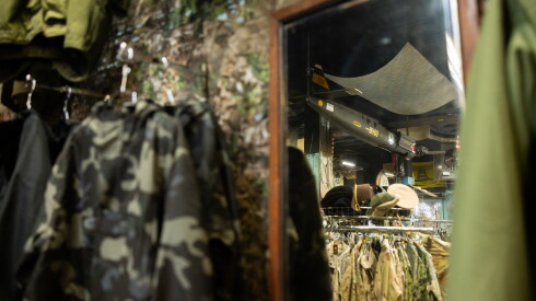 A World War II drone, once used for target practice, hangs from the ceiling inside Army Navy Sales in Lake View.