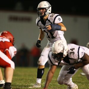 Lisle’s Nick Martich looks over the Streator offense. | Allen Cunningham / for Chicago Sun-Times