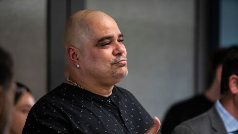 Daniel Rodriguez gives a thumbs up while speaking during a news conference this spring after prosecutors agreed to throw out his 1991 murder conviction. Rodriguez spent decades claiming he was framed by former Chicago Police Detective Reynaldo Guevara.