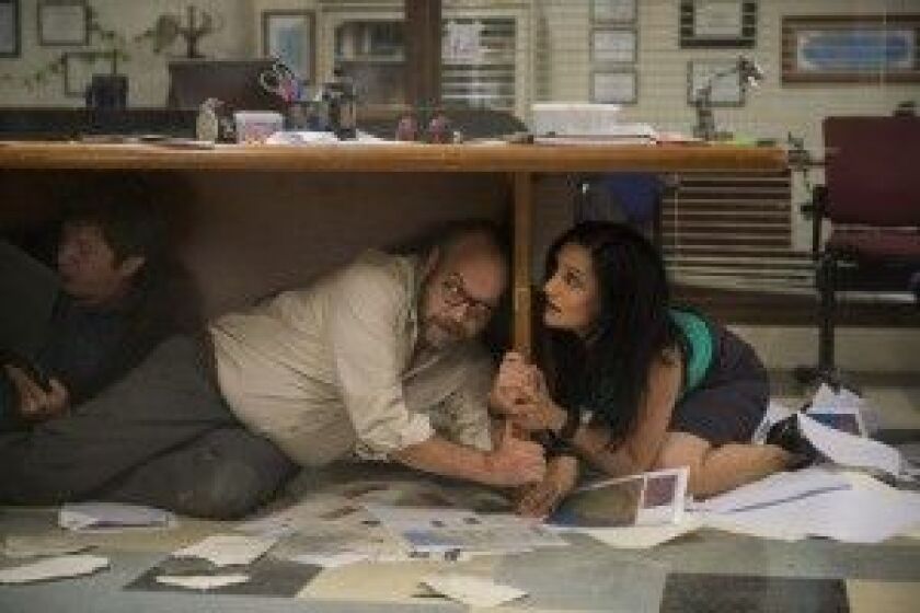 Paul Giamatti and Archie Panjabi in “San Andreas.” | Warner Bros.