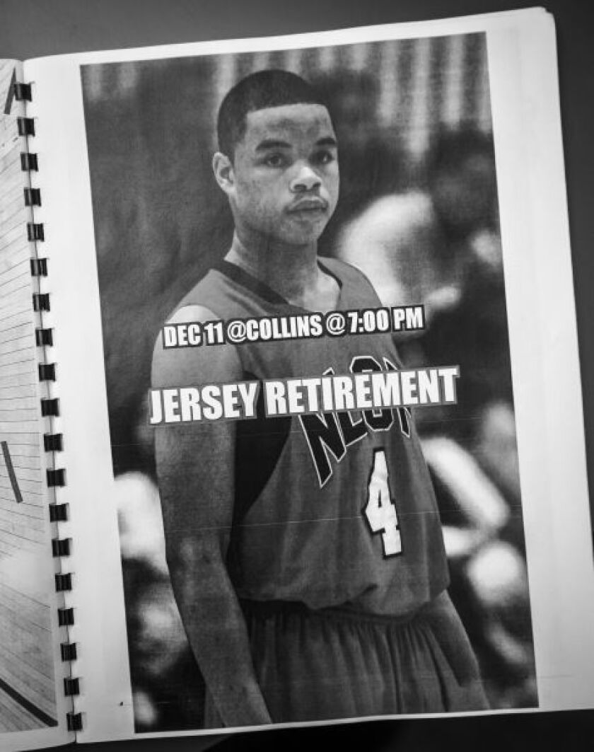 Page from a program honoring Jonathan Mills, a former North Lawndale star who was gunned down on the sidewalk on the way to the gym.
