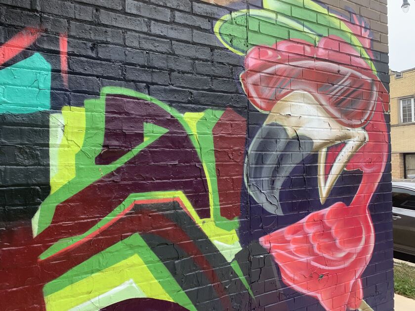 The flamingo in the mural at Quiroga’s Detail & Hand Car Wash, 3389 N. Milwaukee Ave., represents tropical regions in South America.