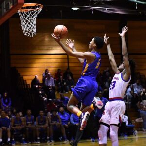 Simeon’s guard Bryce Hall (5) floats straight to the rim. Worsom Robinson/For the Sun-Times.