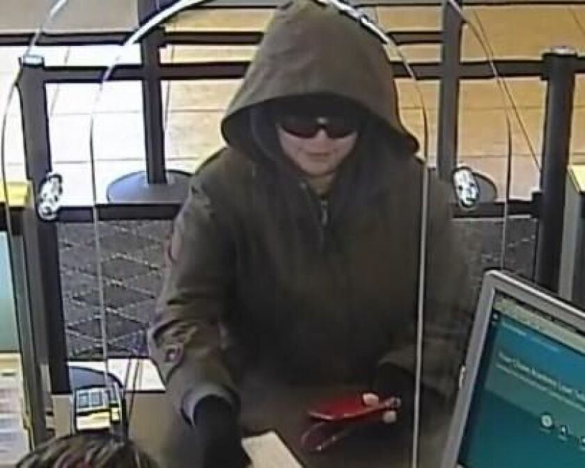 Surveillance image of the suspect in a robbery Feb. 15 at the Chase Bank branch at 1959 W. Division St. | FBI