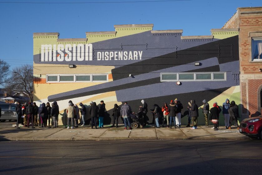 People wait hours in line at Mission Dispensary in South Shore on the first day of legalized recreational cannabis in Illinois, Wednesday morning, Jan. 1, 2020.