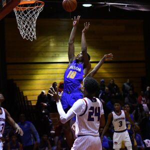 Simeon’s Frederick Poole (10) goes to the rim. Worsom Robinson/For the Sun-Times.