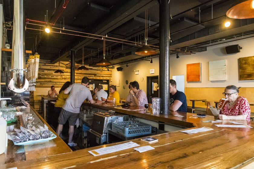 Patrons drink beers at Dovetail Brewery in the 1800 block of West Belle Plain Avenue in Ravenswood. | Tyler LaRiviere/Sun-Times