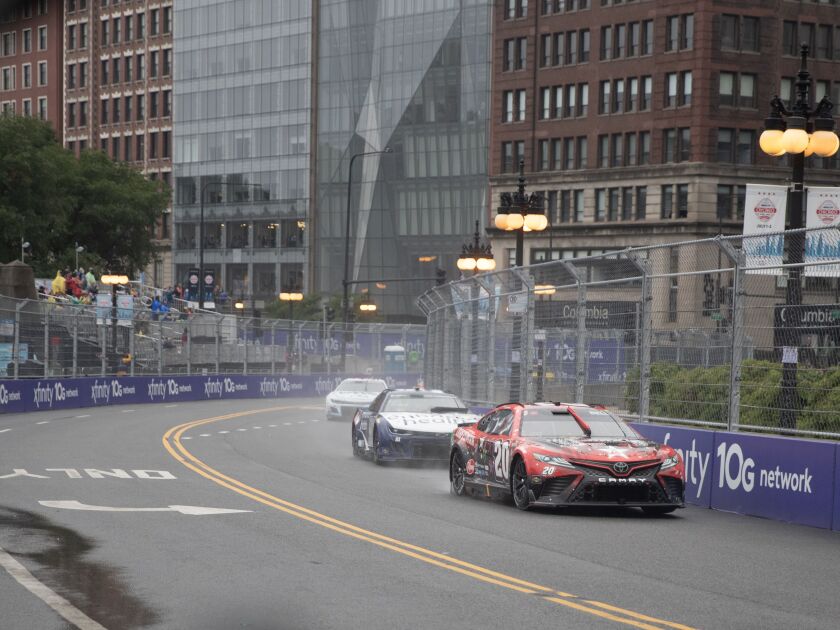 NASCAR race cars climb up Columbus Plaza during the Grant Park 220 NASCAR Chicago Street Race.