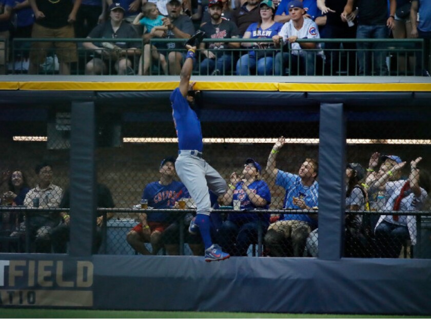 <em>Cubs right fielder Jason Heyward robs Ryan Braun of a would-be homer in the third.</em>