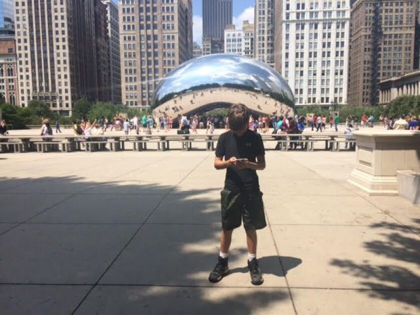 A player on the game’s yellow team, 12-year-old Nick Meesey, said his best advice for other Pokémon GO players is to “buy a portable charger because it sucks your battery out.” | Angie Stewart/Chicago Sun-Times